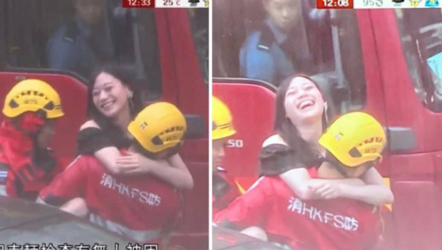 港女熊抱救援消防員，嘴角笑容藏不住，網(wǎng)民：羨慕