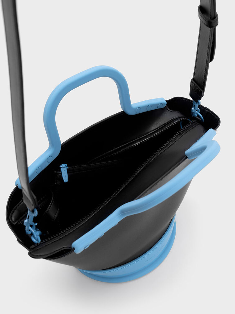 Fan扇形手提袋、$639、Charles & Keith，配搭可拆式調(diào)節(jié)肩帶，附可拆式小收納袋。