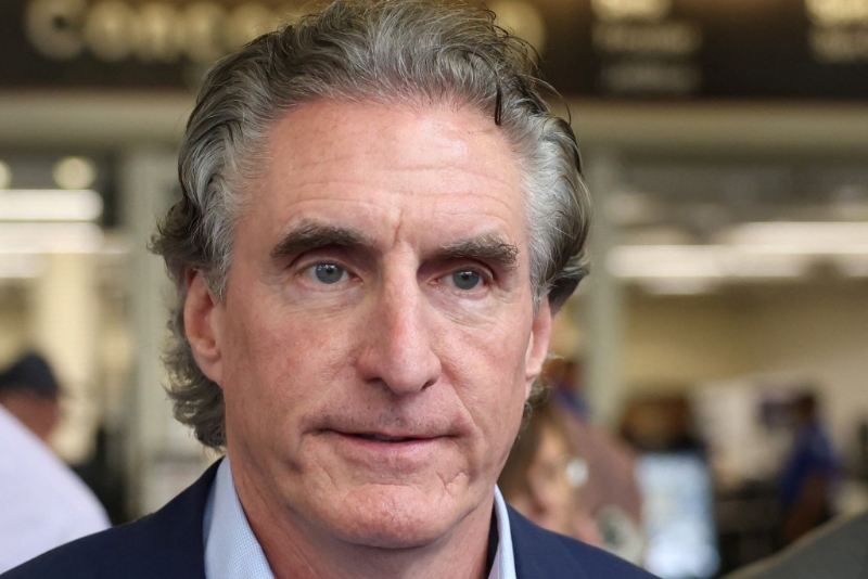 北達(dá)科他州州長伯古姆抵達(dá)密爾沃基。（路透社）