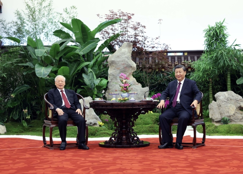 習(xí)近平同阮富仲茶敘。 新華社