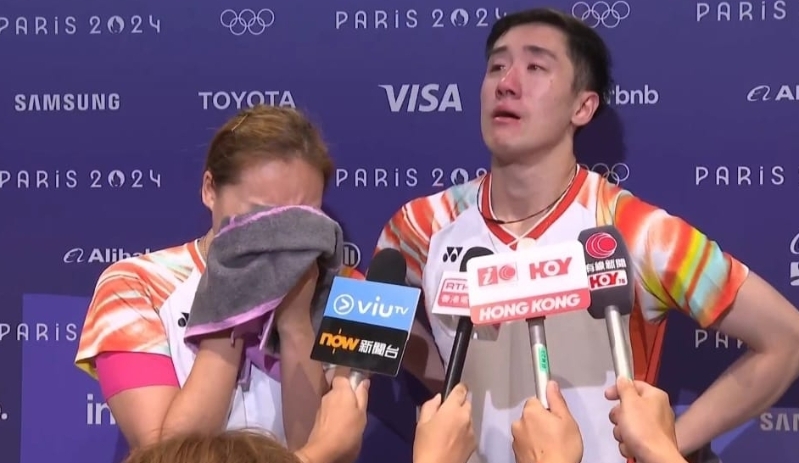 鄧俊文及謝影雪賽后帶淚受訪。