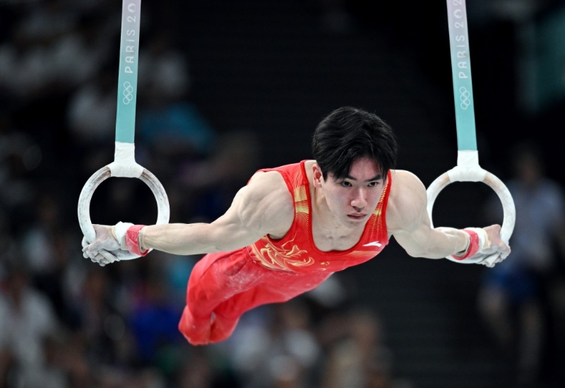 張博恒體操男子全能獲銀牌。 新華社