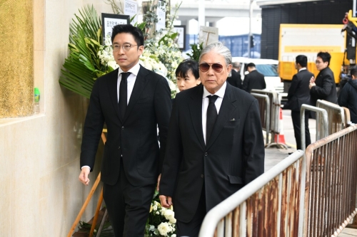 港協(xié)暨奧委會會長霍震霆及其兒子霍啟山。