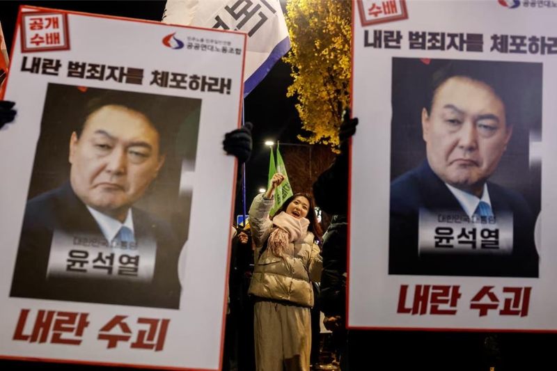 圖為韓國(guó)示威民眾。（路透社）