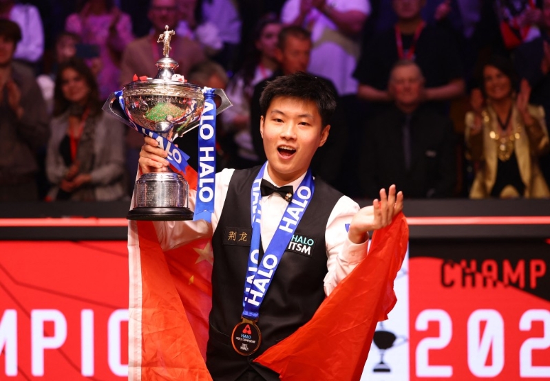 趙心童奪冠后，成為賽事史上首位封王的業(yè)余球手，以及首位稱霸的中國球手。路透社.jpg