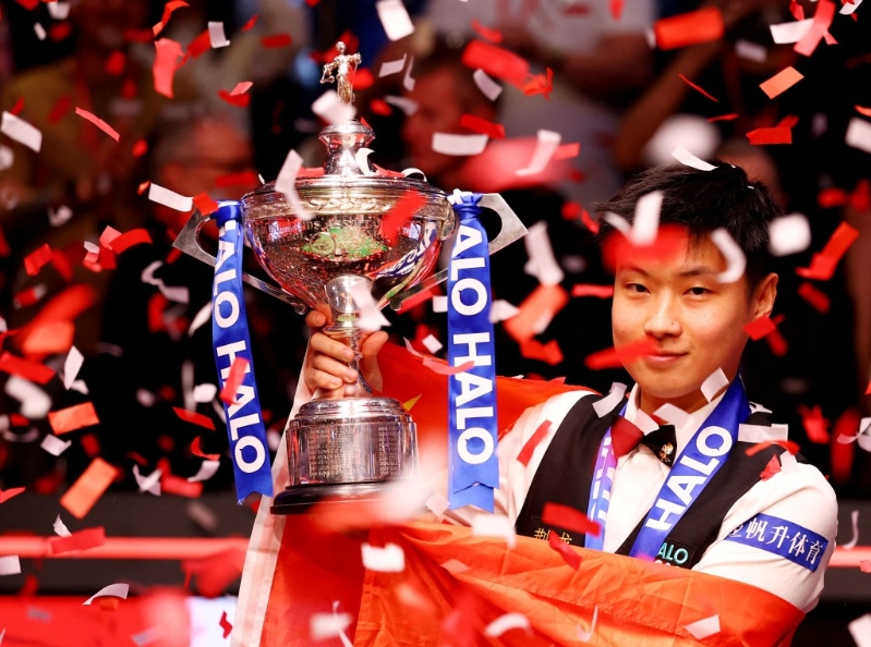 趙心童奪冠后，成為賽事史上首位封王的業(yè)余球手，以及首位稱霸的中國球手。 路透社.jpg