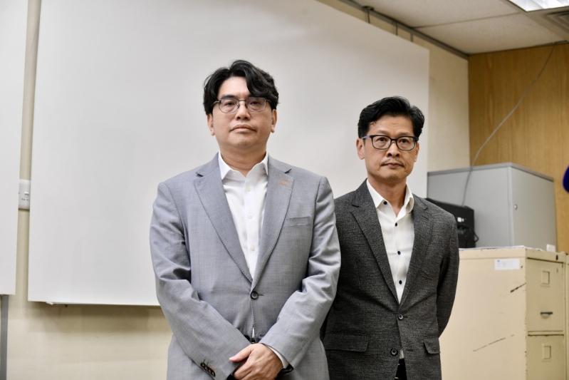 左起：水務(wù)署署長黃恩諾、房屋署副署長（屋邨管理）楊耀輝。