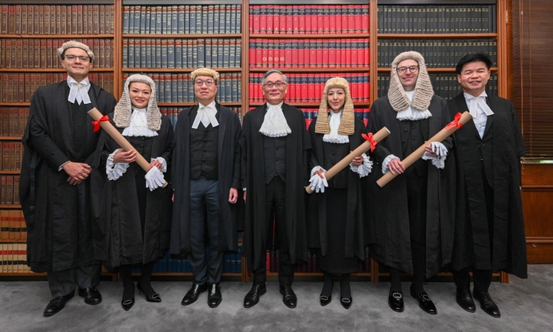 張舉能（中）、林定國(guó)（左3）、毛樂(lè)禮（左1）和湯文龍（右一）與林定韻（右3）、林芷瑩（左2）和白天賜（右2）合照。 政府新聞處