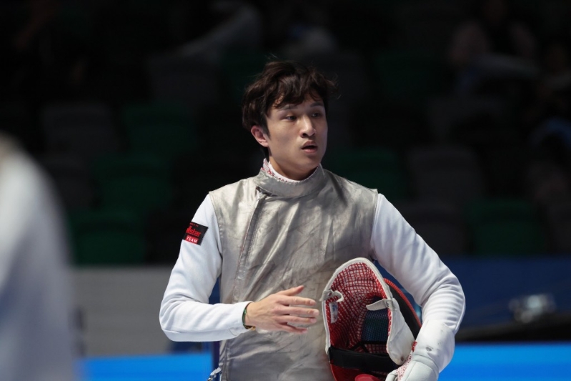 蔡俊彥出戰(zhàn)男花團體賽。