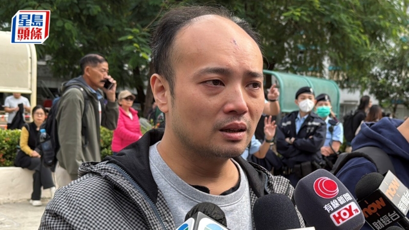 鐘先生表示，太太與愛貓至今仍未能救出。