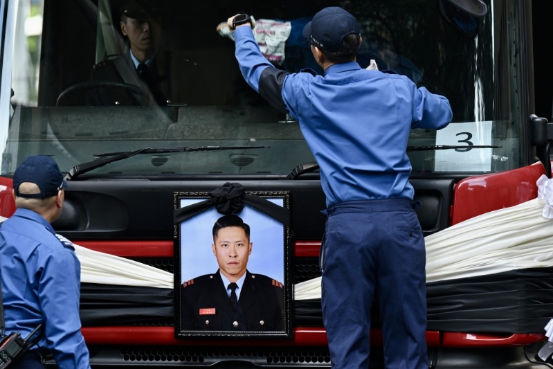 運(yùn)送何偉豪遺體的靈車。